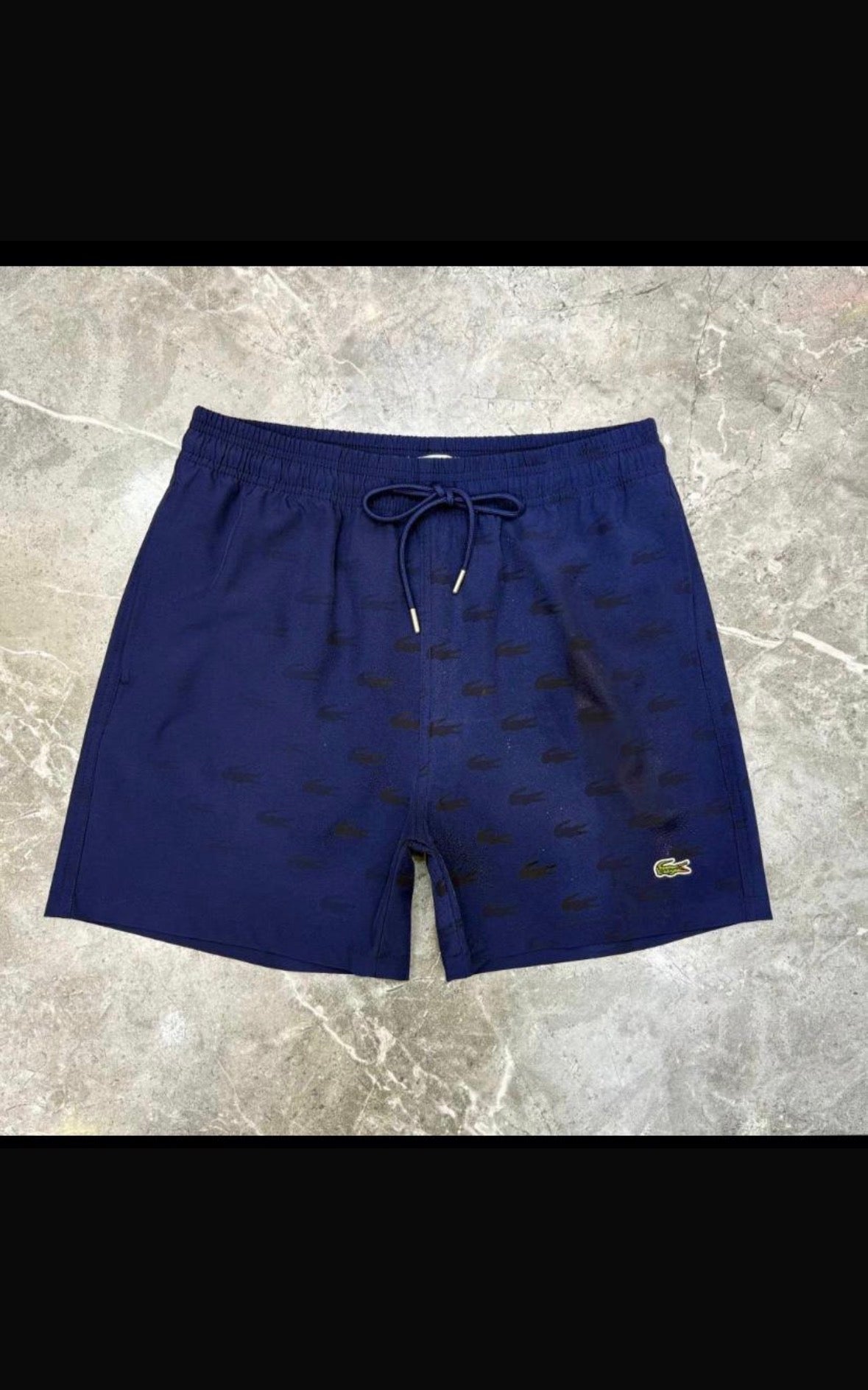 Short de bain Lacoste Water Reveal – Effet magique dans l’eau